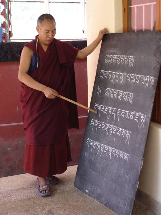 Bon lama teaching Tib language from The Gatekeeper book