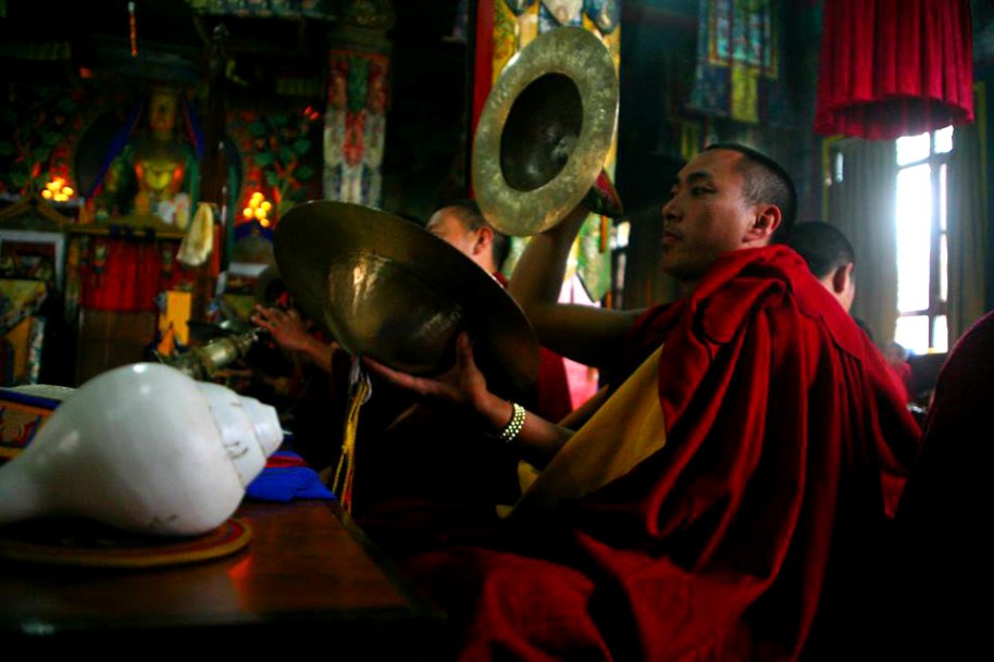 monk playing large cymbals Triten Norbutse